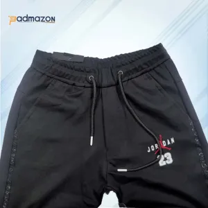 Coogi black embroidered stretch casual pants