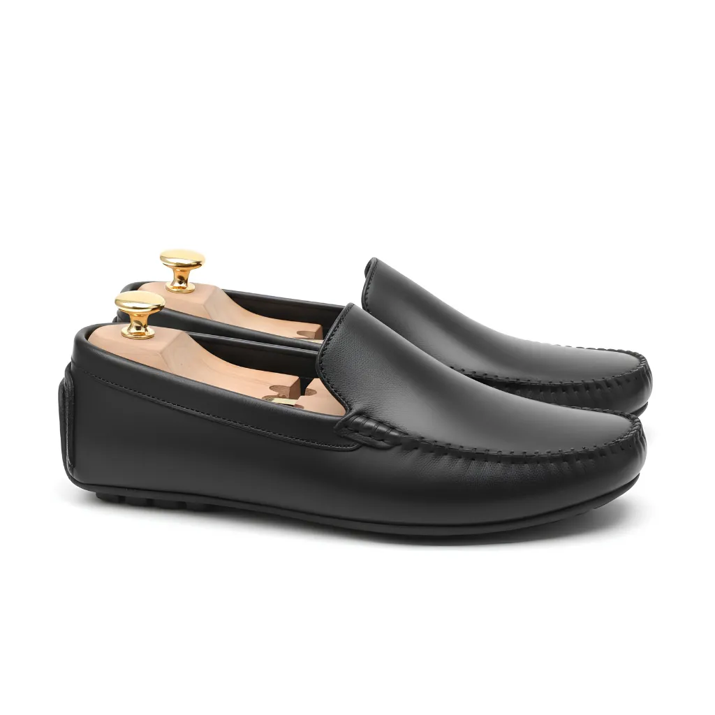 Premium Leather Plain Moccasin in Black adds a refined touch to your look, with a simple slip-on style for casual and smart-casual outings.