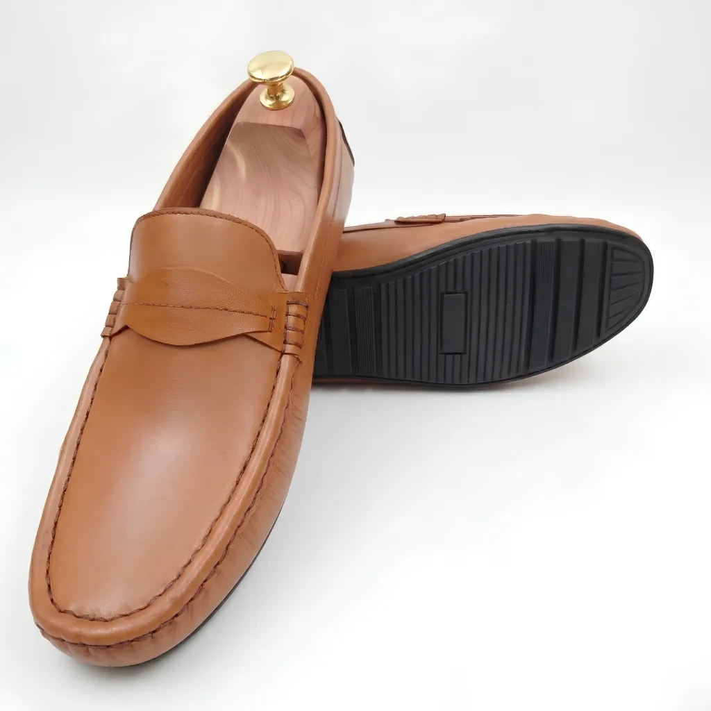 Premium Leather Saddle Moccasin in Tan adds a smart touch to casual outfits. Pair it with jeans or chinos for a refined look on everyday outings.